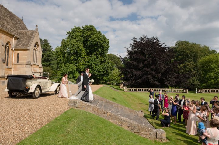Bride and groom arriving at Exton Park in Rutland