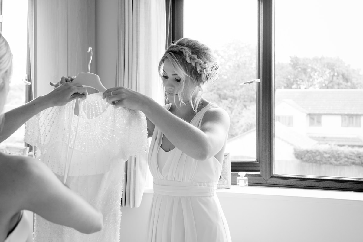 Bride getting ready for her wedding at home in Great Oakley, Northamptonshire (3)
