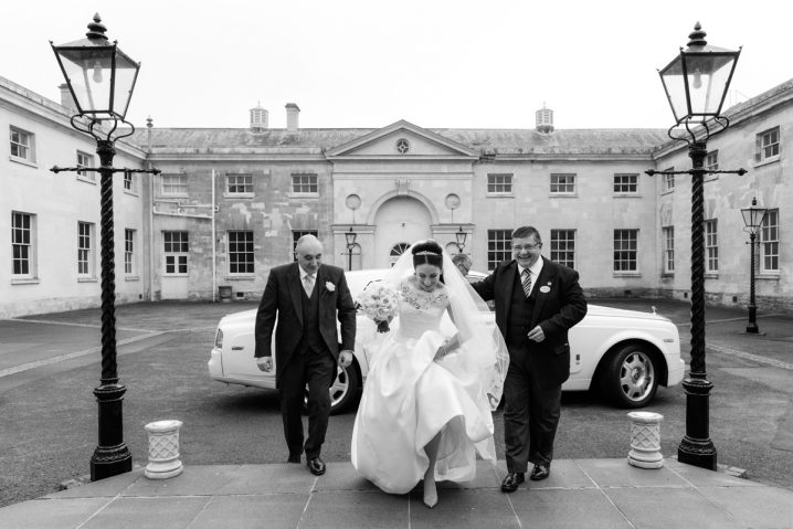 Bride going in to The Sculpture Gallery, Woburn Abbey