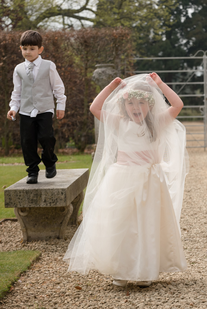 Children playing at a wedding at The Sculpture Gallery, Woburn Abbey
