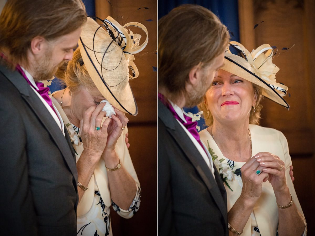 Mother of the bride crying during wedding ceremony at Woodnewton church, Peterborough