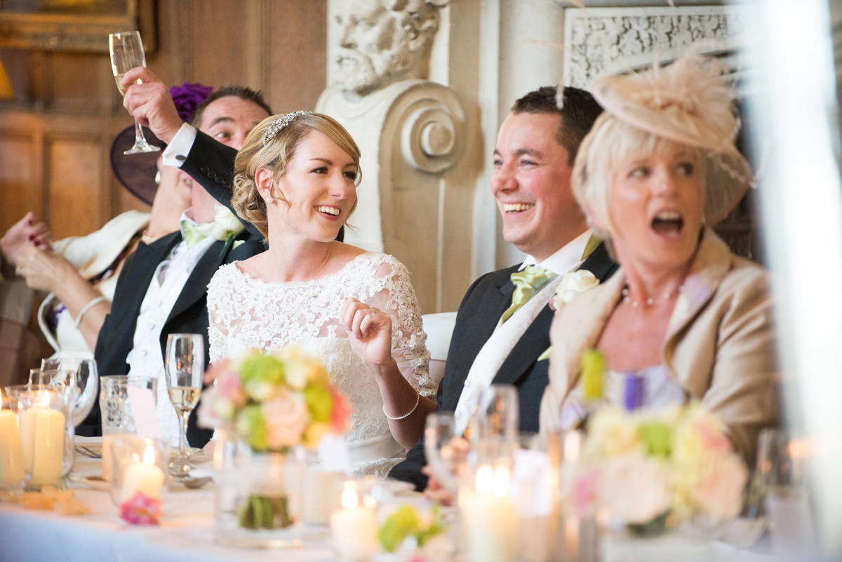 Bride laughing at the best man's speech