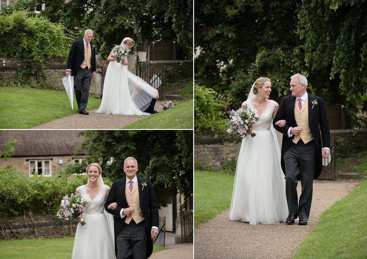Bride and her dad walking up the church path at St Mary's in Geddington, Northants