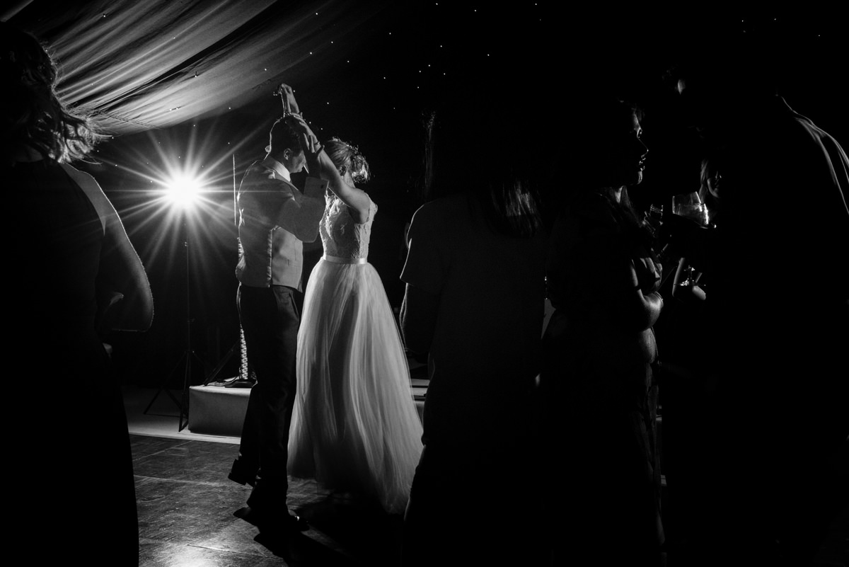 Bride and groom's first dance at a marquee wedding in Geddington, Northants