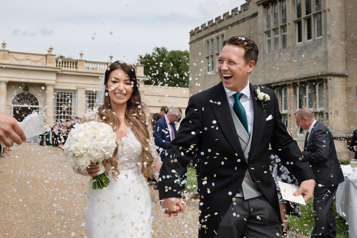 Confetti in front of the orangery at Rushton Hall