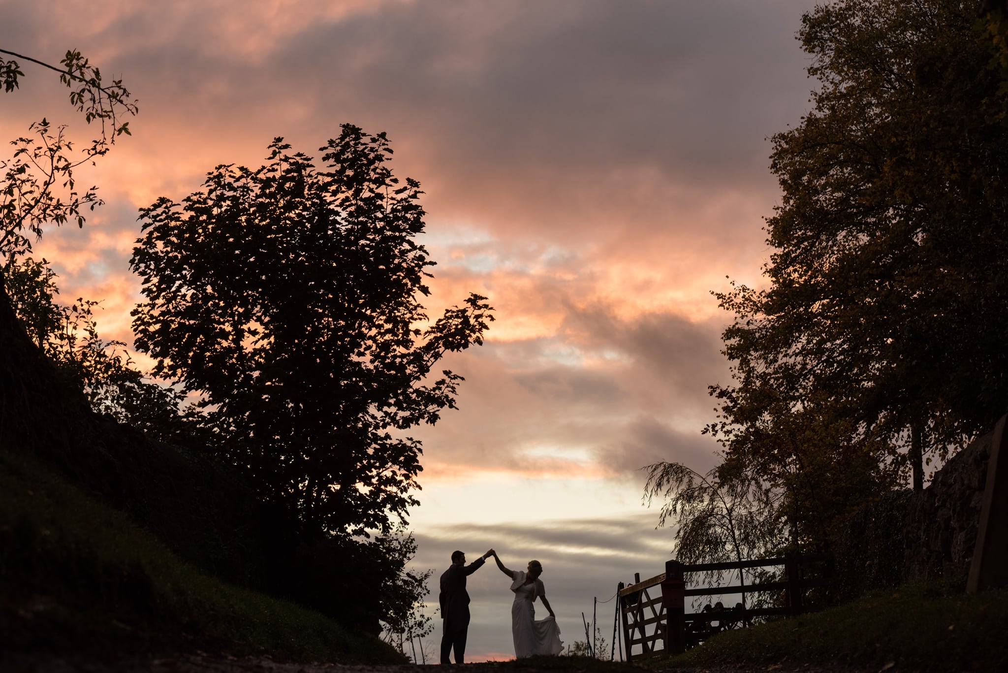Couple dancing at Dodford Manor sunset