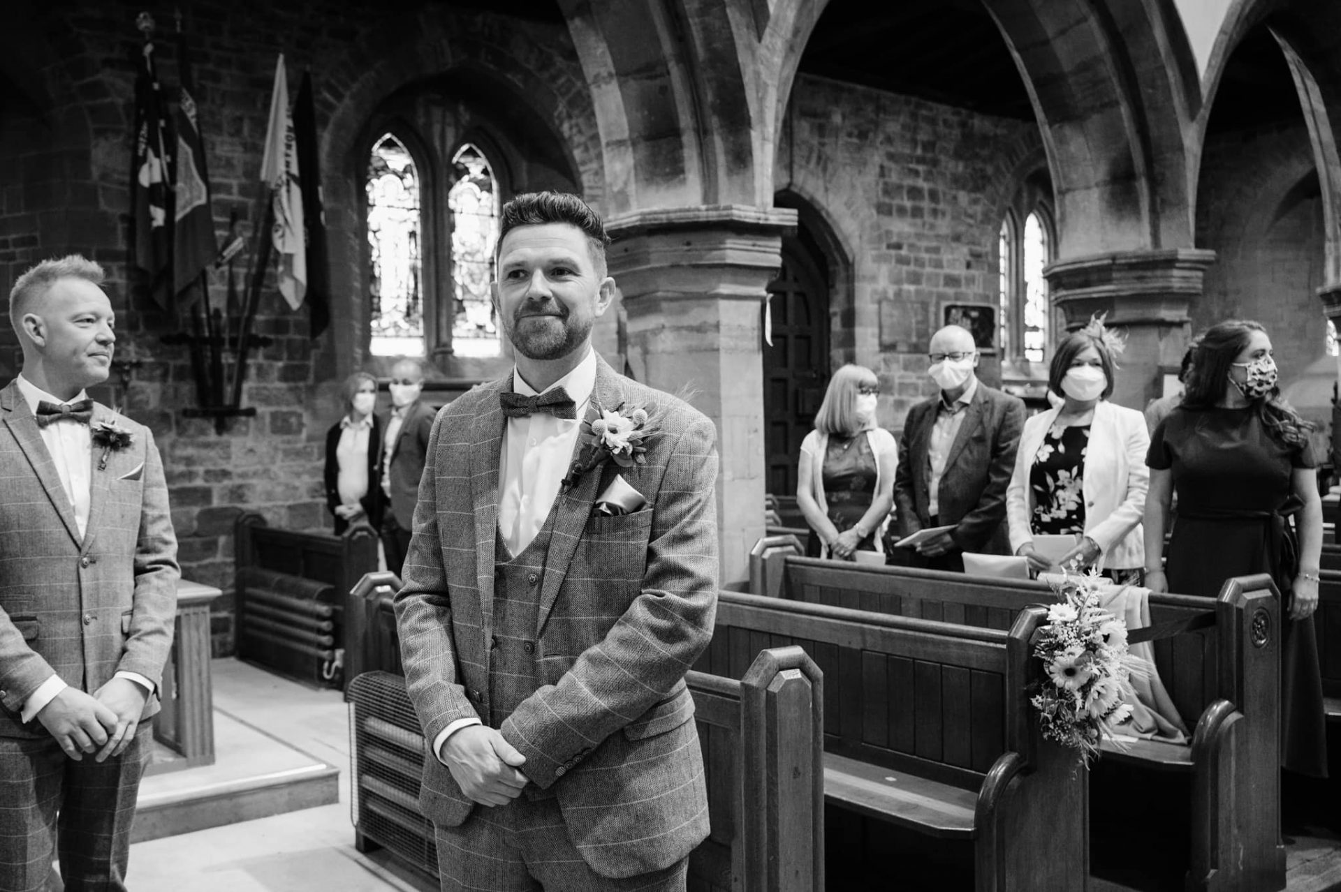 Groom waiting for the bride at Dallington church