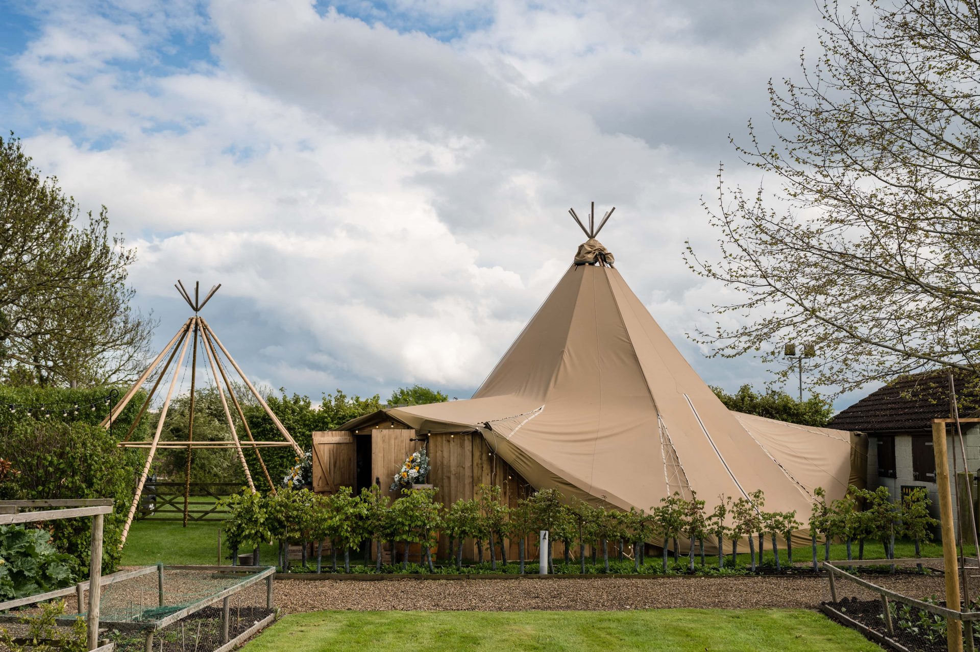 A single hat tipi for an intimate wedding at Hill Farm House in Brigstock