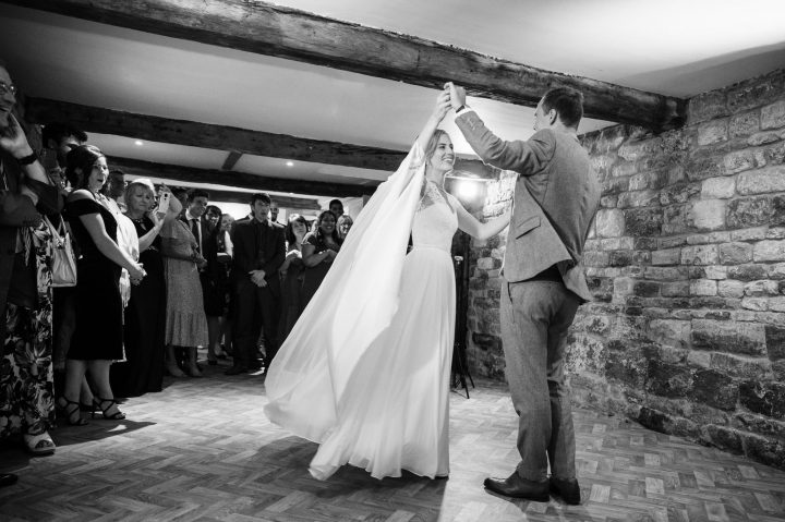 A bride and groom's first dance in the cellar bar of Walkers' House at Rockingham Castle