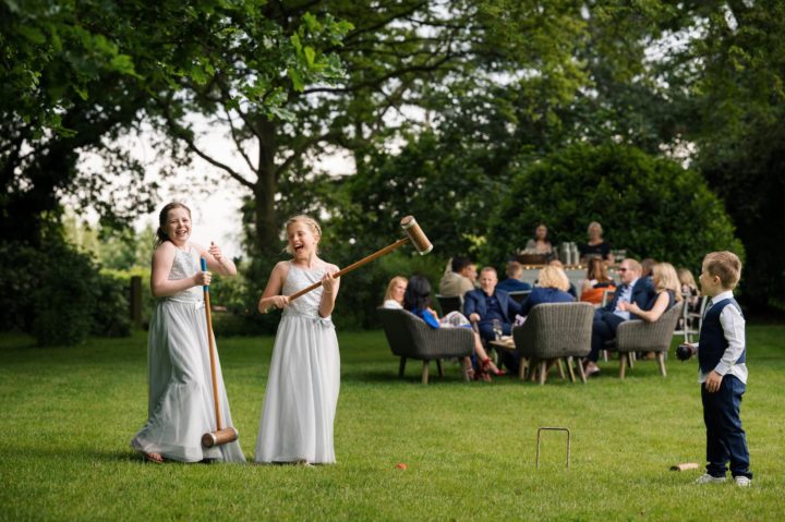 Children playing croquet at Dodmoor House