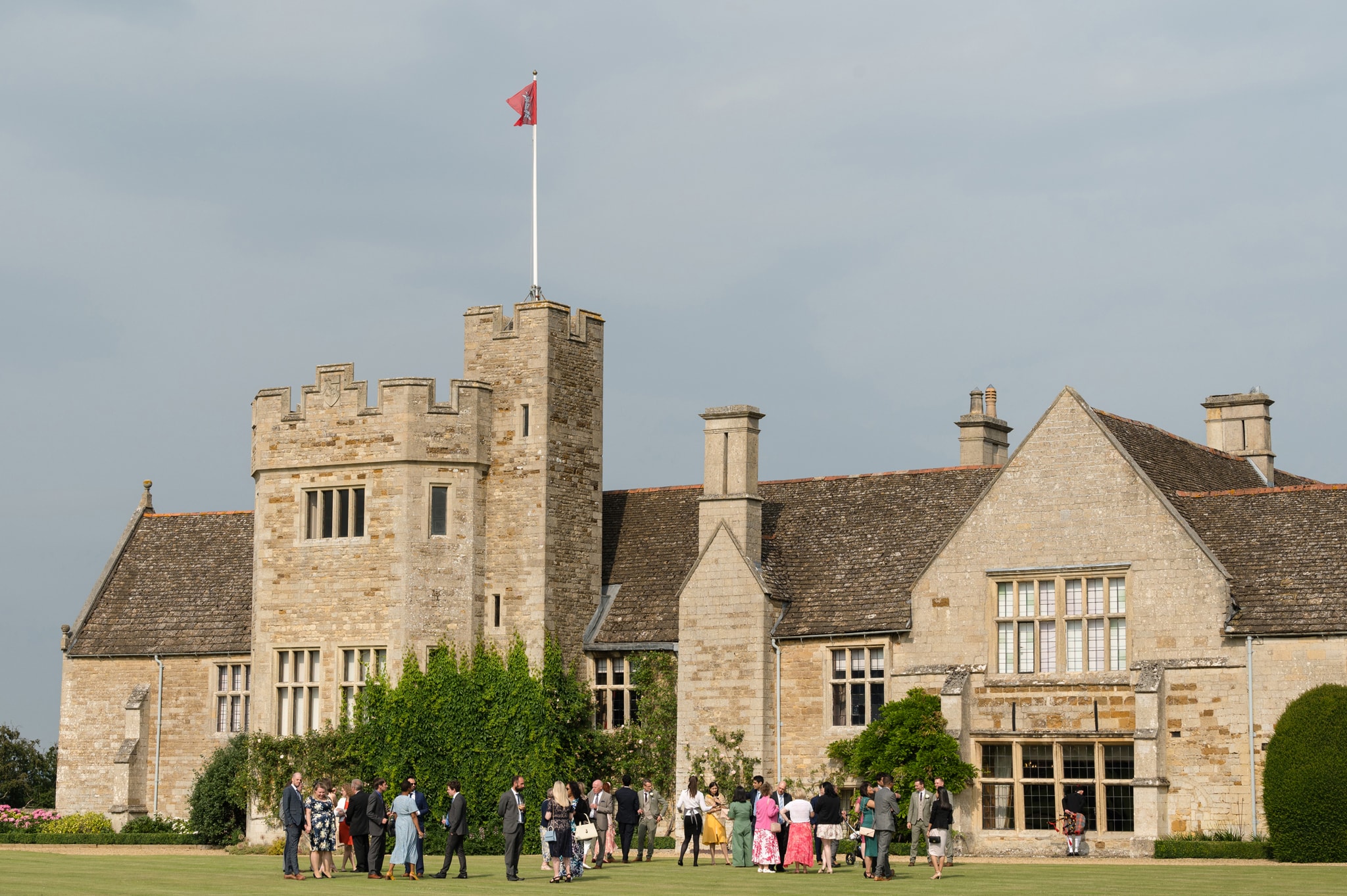 Wedding reception on the lawn in front of a castle