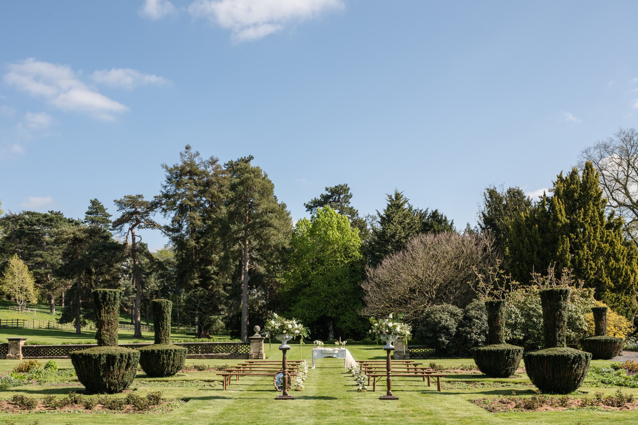 An outdoor ceremony set-up in the gardens at Sutton Bonington Hall