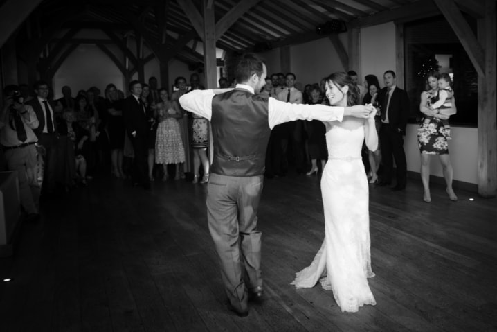 Bride and groom performing a choreographed first dance at Dodford Manor