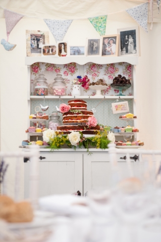 A vintage dresser full of sweet treats for a wedding