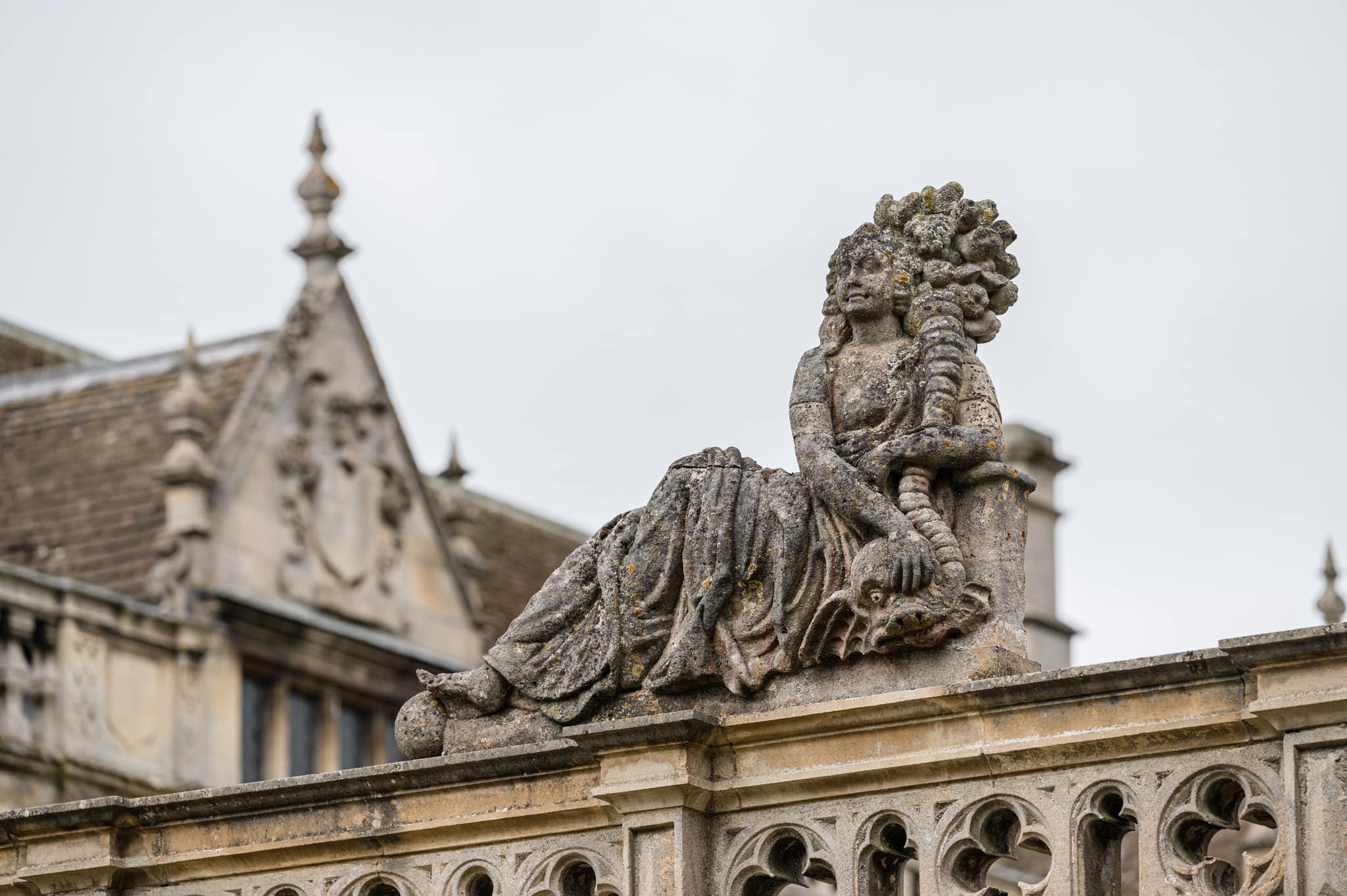 A statue on the roof at the entrance to Rushton Hall