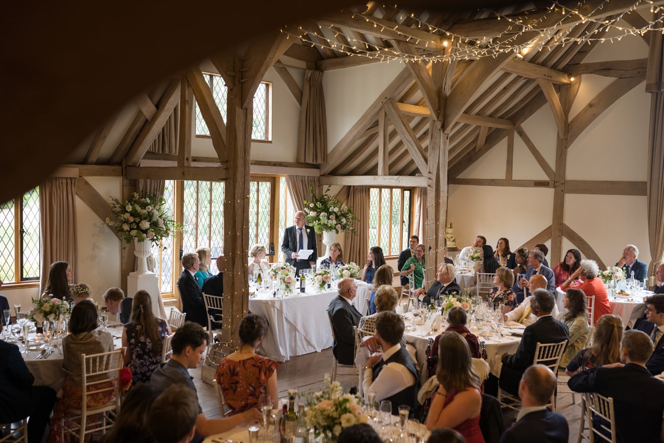 A wide view of the music room at Cain Manor as the Bride's dad makes his speech