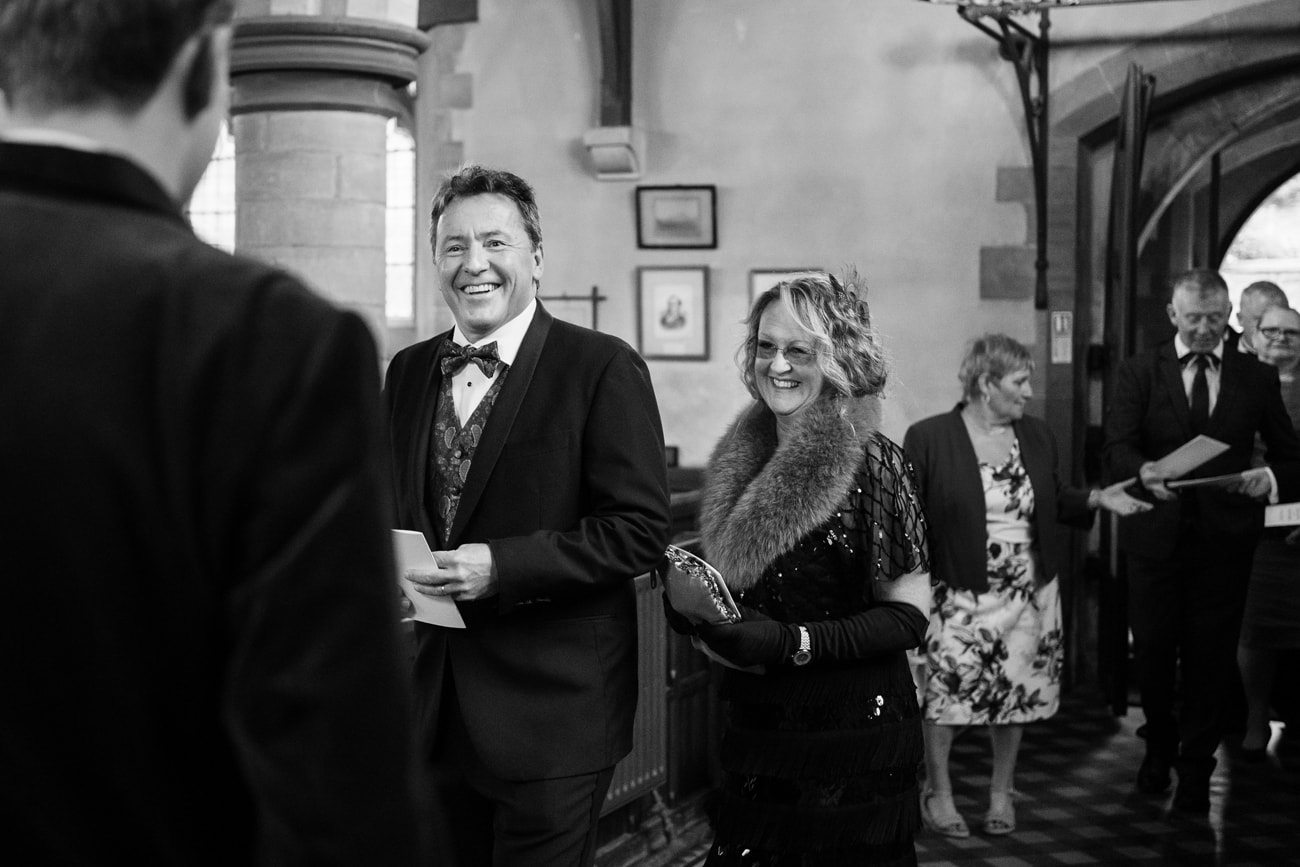 Wedding guests walking into St Michael's church in Silverstone