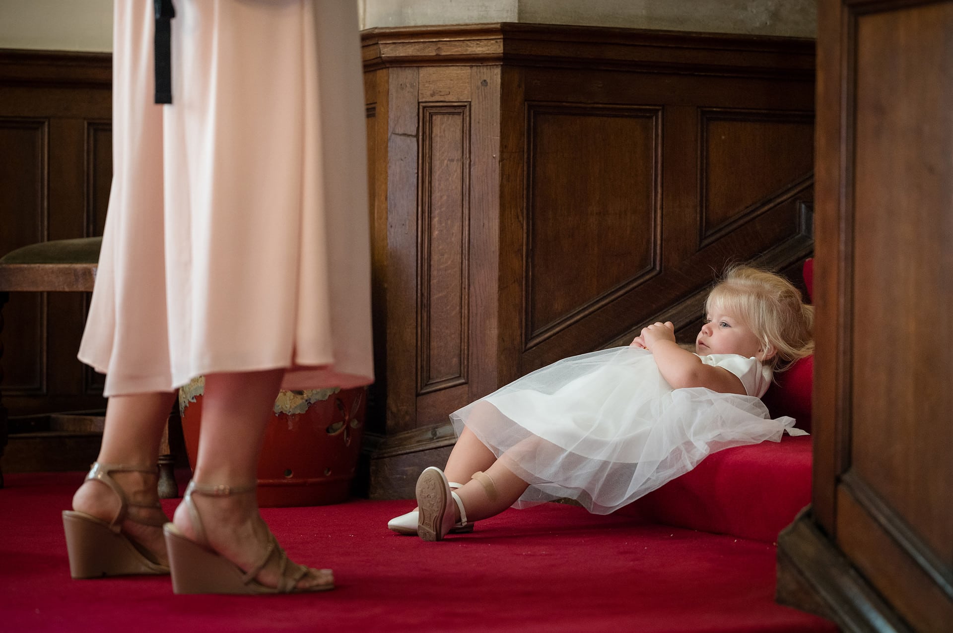 Flower girl laying on stairs