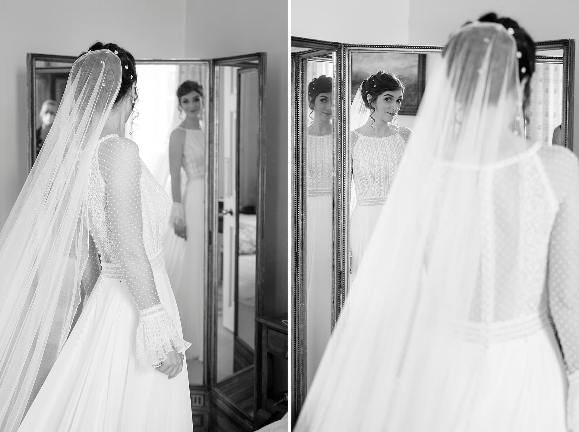 Bride ready in her dress and veil looking in a tri-fold mirror with multiple reflections