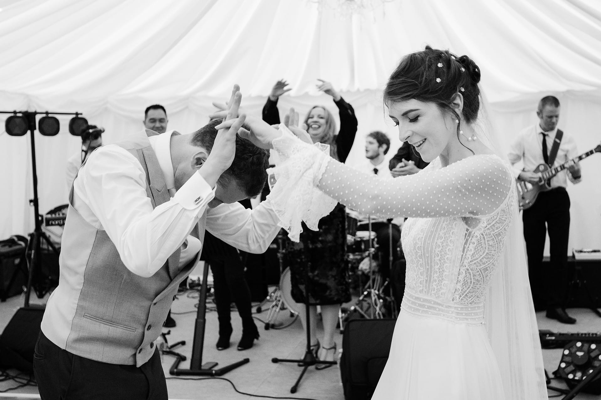 Bride and groom doing a fast first dance