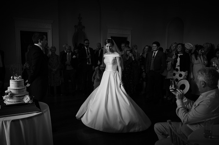 The bride twirling in her wedding dress