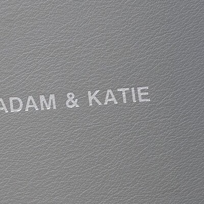 Close up of a silver foil title on the front cover of a wedding album