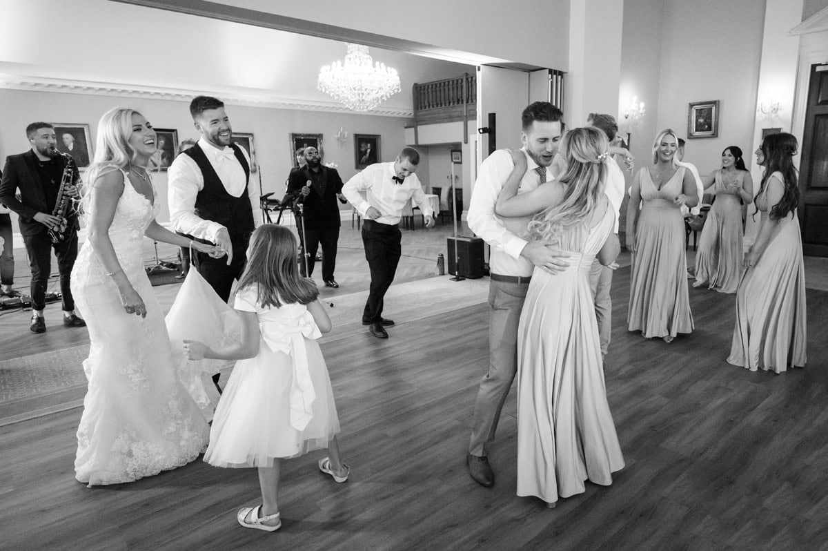 Wedding guests filling the dancefloor at a wedding with a live band